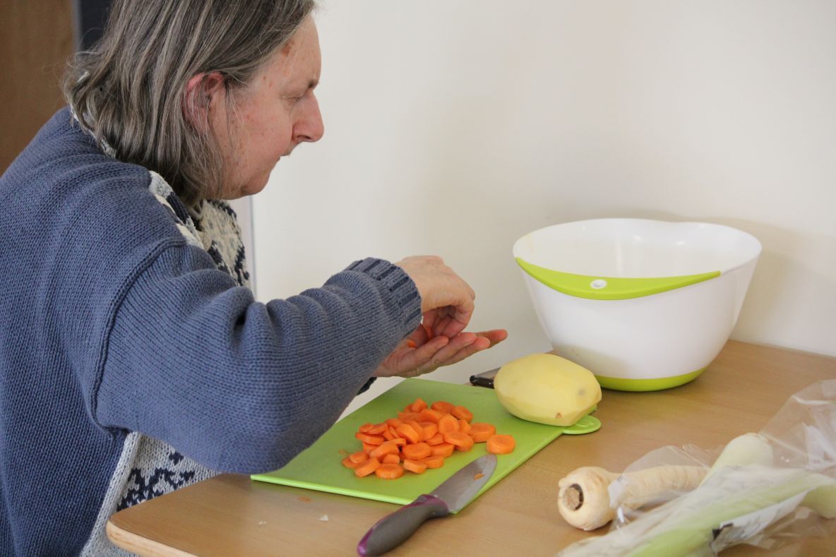 Person preparing vegetables
