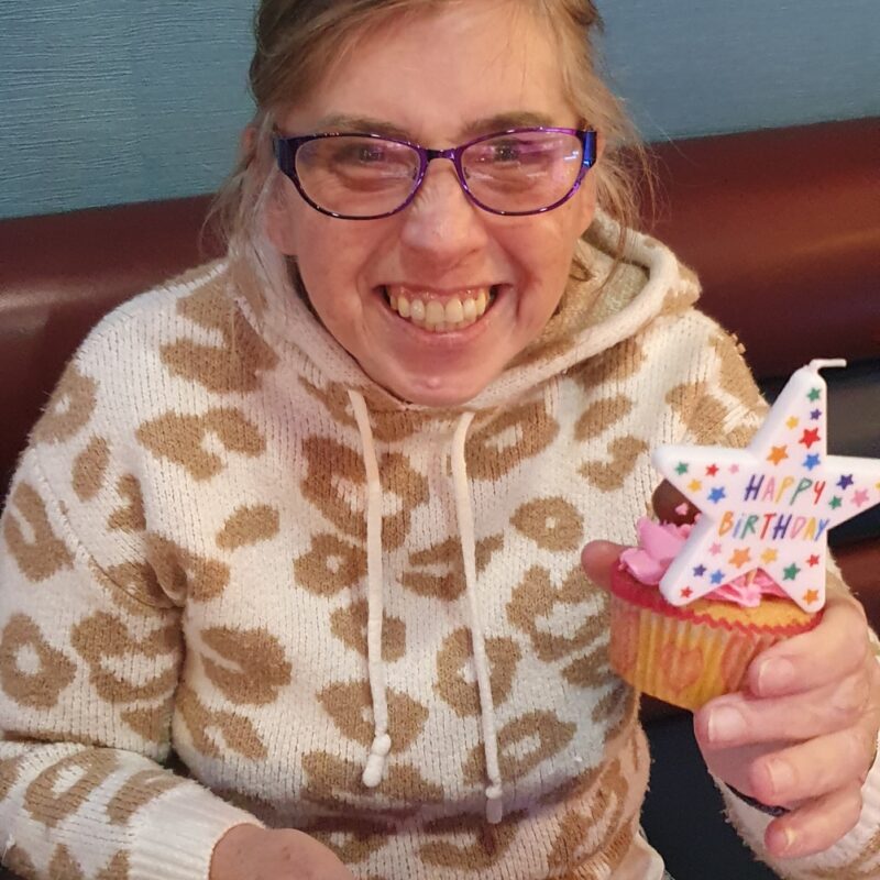 Christine with birthday cupcake