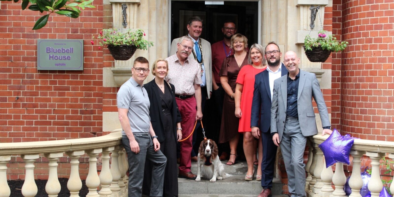 Group standing outside Bluebell House 1