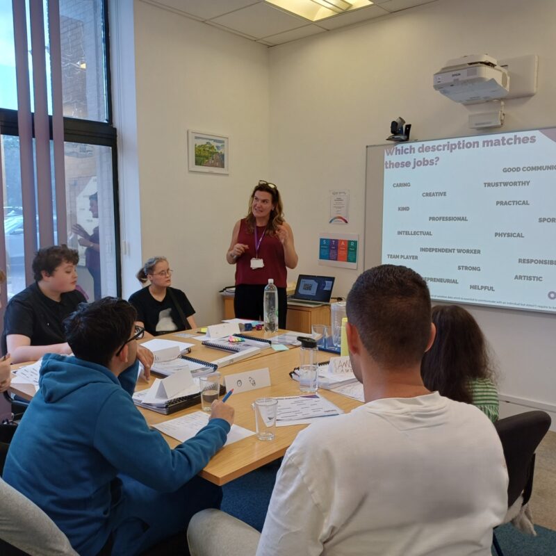 Ace 2026 students looking at presenter