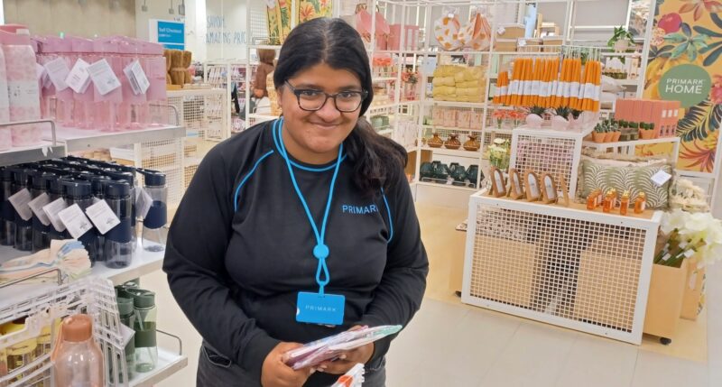 H working in a store